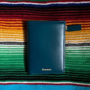 like new Fennec turquoise leather wallet